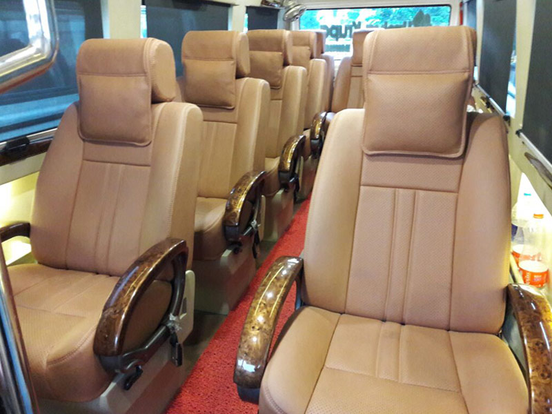 Tempo traveller 12 seater price